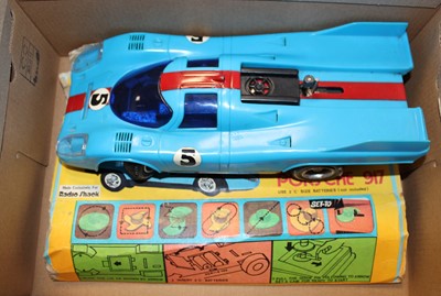 Lot 711 - A Porsche 917 battery powered computer car by...