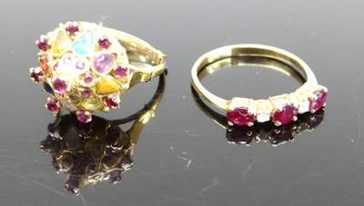 Lot 321 - An 18ct gold, ruby and cz set half hoop ring,...