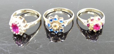 Lot 322 - A 9ct gold, blue and white paste set cluster...