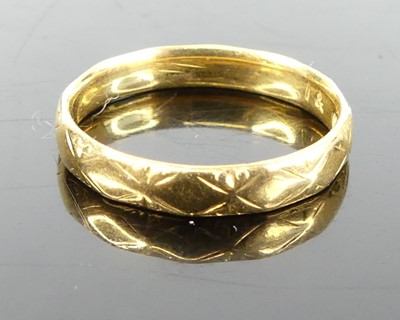 Lot 333 - A 22ct gold wedding band, sponsor JG&S, 2.7g,...