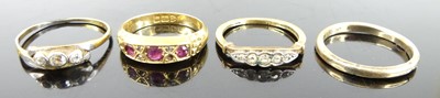 Lot 334 - An 18ct gold, ruby and diamond point set half...