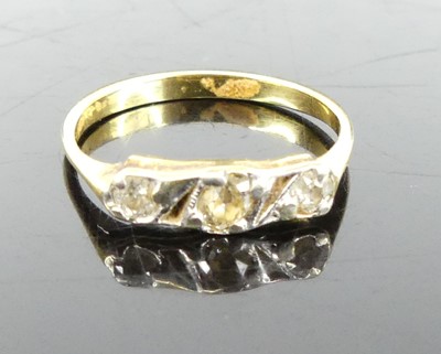 Lot 337 - A yellow metal diamond set ring, arranged as...