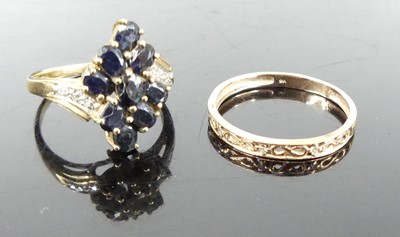 Lot 339 - A modern 9ct gold and sapphire cluster ring,...