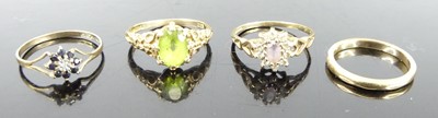 Lot 343 - Four various 9ct gold rings, to include a...