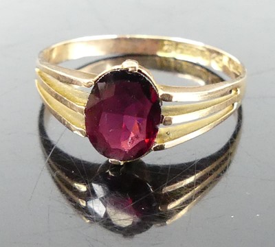 Lot 350 - A 9ct gold garnet set dress ring, sponsor T&C,...