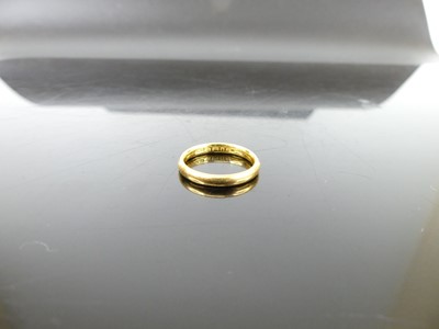 Lot 353 - A 22ct gold wedding band, sponsor F&G, 3.4g,...