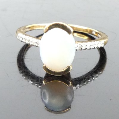 Lot 354 - A 9ct gold opal dress ring, the shoulders each...