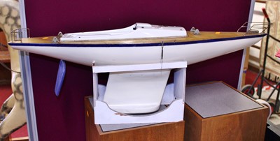 Lot 743 - A wooden kit built model boat with stand