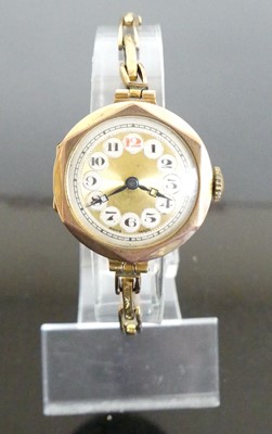 Lot 380 - A 9ct gold lady's vintage manual wind...