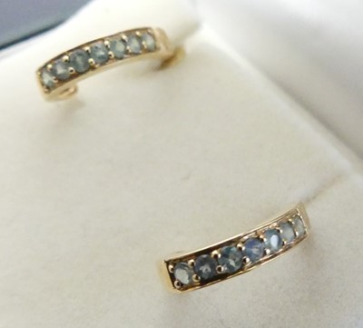 Lot 394 - A pair of modern 9ct gold and green topaz set...