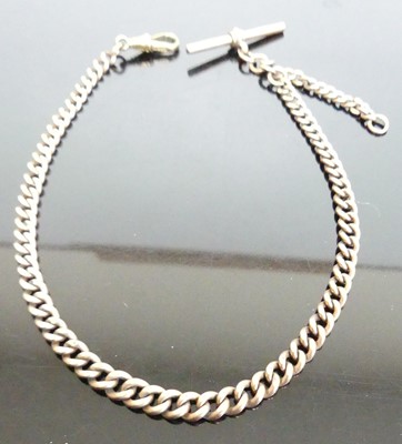 Lot 398 - A 9ct gold graduated curblink watch chain,...