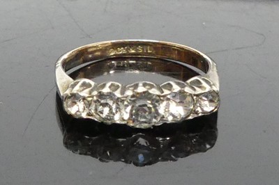 Lot 412 - A 9ct gold and silver, white hardstone set...