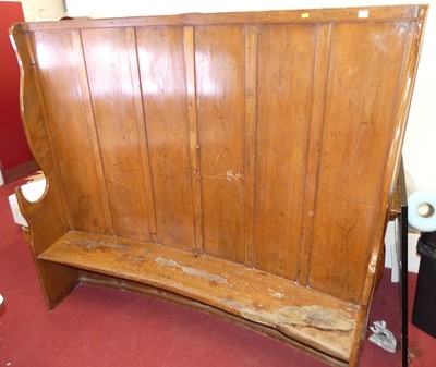 Lot 1166 - A 19th century elm curved bench settle, with...