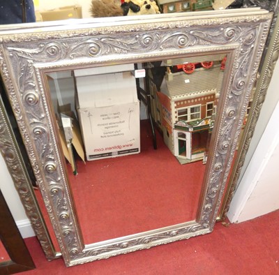 Lot 1169 - A contemporary floral silvered framed bevelled...