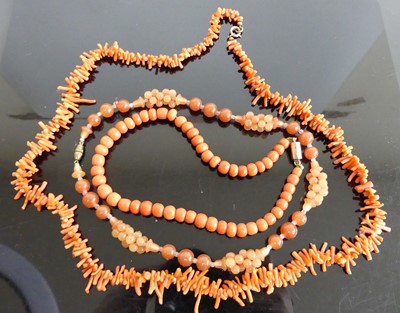 Lot 430 - A natural coral long necklace, 70cm; together...