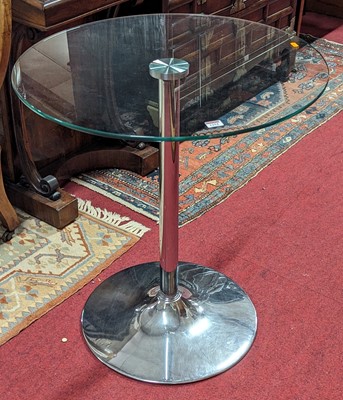 Lot 1294 - A contemporary glass topped and chromed metal...
