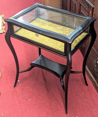 Lot 1202 - An Edwardian stained walnut hinged top...