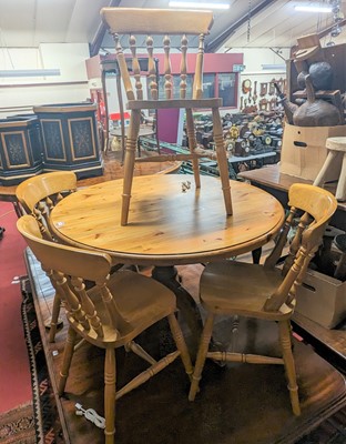 Lot 1301 - A modern pine circular breakfast table,...