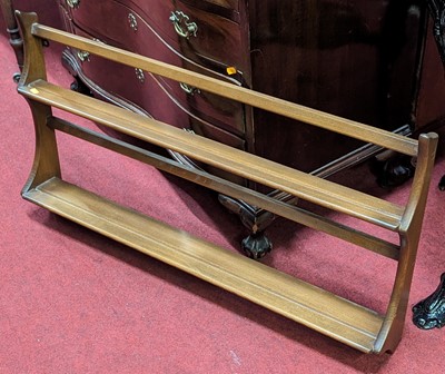 Lot 1216 - A contemporary Ercol mid elm two-tier open...