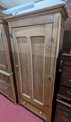 Lot 1218 - A rustic pine single door side cupboard having...