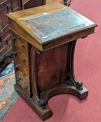 Lot 1235 - A mid-Victorian rosewood slope front Davenport,...
