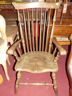 Lot 1323 - An early 20th century elm seat and beech...