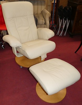 Lot 1327 - A contemporary cream leather upholstered...