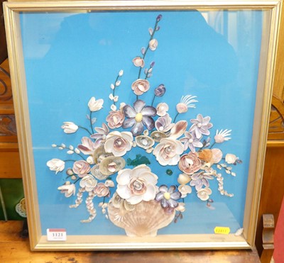 Lot 1121 - A framed display of shell art,  37 x 35cm