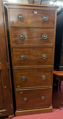 Lot 1251 - A mahogany narrow chest of five long graduated...