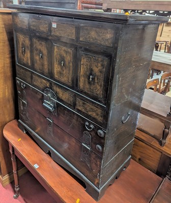 Lot 1252 - An Eastern elm and iron mounted side cupboard,...