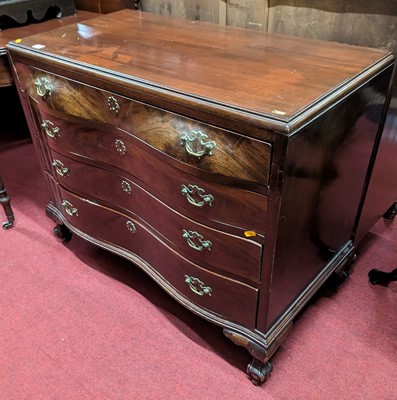 Lot 1255 - A Dutch mahogany bombe shaped chest, of four...