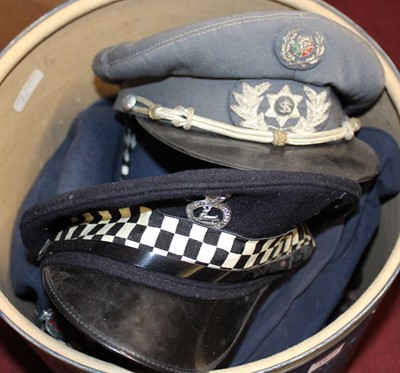 Lot 1674 - Two hat boxes of various military headwear, to...