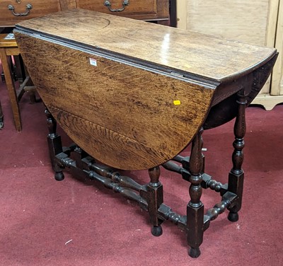 Lot 1266 - An 18th century joined oak gateleg table