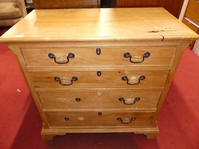 Lot 1352 - A pine chest of four long drawers on bracket...