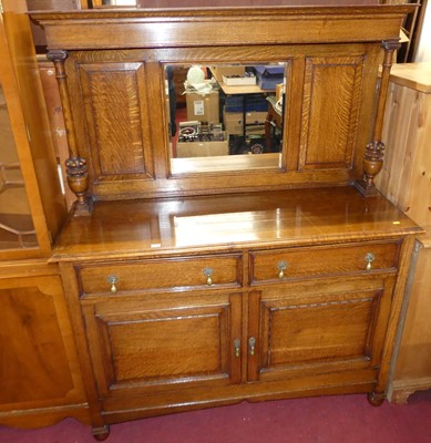 Lot 1354 - An early 20th century oak mirrorback sideboard,...