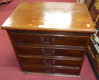 Lot 1366 - An Edwardian walnut four drawer music chest,...