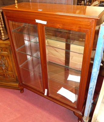 Lot 1368 - A contemporary mahogany double bevelled glass...