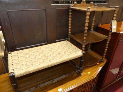 Lot 1369 - A Victorian figured walnut three-tier...