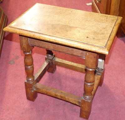 Lot 1371 - A joined oak and elm joint stool, raised on...