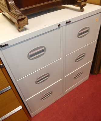 Lot 1381 - A pair of Silverline metal three drawer office...