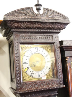 Lot 1526 - An antique oak long case clock having a 10½"...