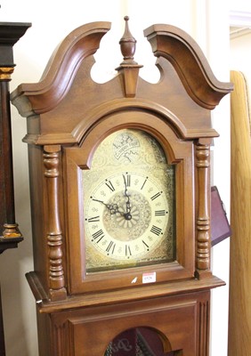 Lot 1528 - A reproduction faux walnut long case clock,...