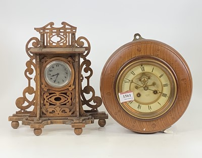 Lot 1561 - An oak cased ships clock, the dial signed...