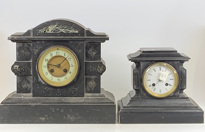 Lot 1565 - A late Victorian slate mantel clock having...