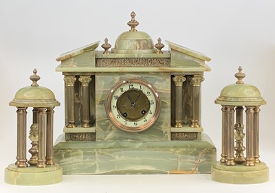 Lot 1578 - A circa 1900 onyx three-piece clock garniture,...