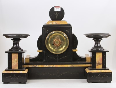 Lot 1586 - A circa 1920 slate and marble inlaid...