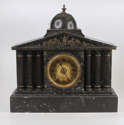 Lot 1627 - A late Victorian polished slate mantel clock,...