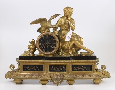 Lot 1634 - A French gilt brass and black slate mantel...