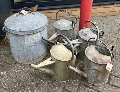 Lot 1392 - A galvanised metal swing handled bucket and...