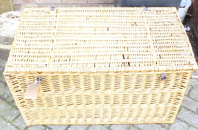 Lot 1393 - A large wicker basket with hinged cover, width...